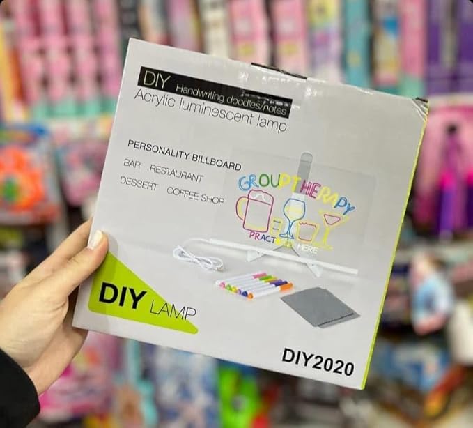 Retail box of the DIY LED acrylic message board lamp held in a hand