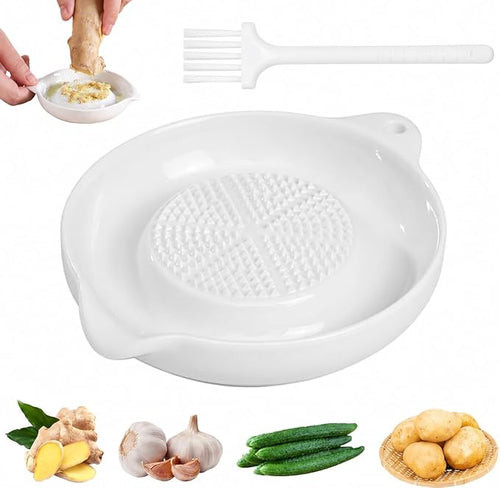 White ceramic garlic and ginger grater plate with cleaning brush, beside ginger, garlic, cucumber and potatoes