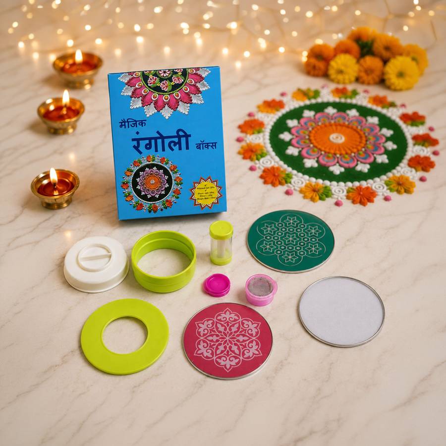Magic Rangoli Box with stencils, mesh discs and colour bottles laid out beside a finished rangoli and lit diyas